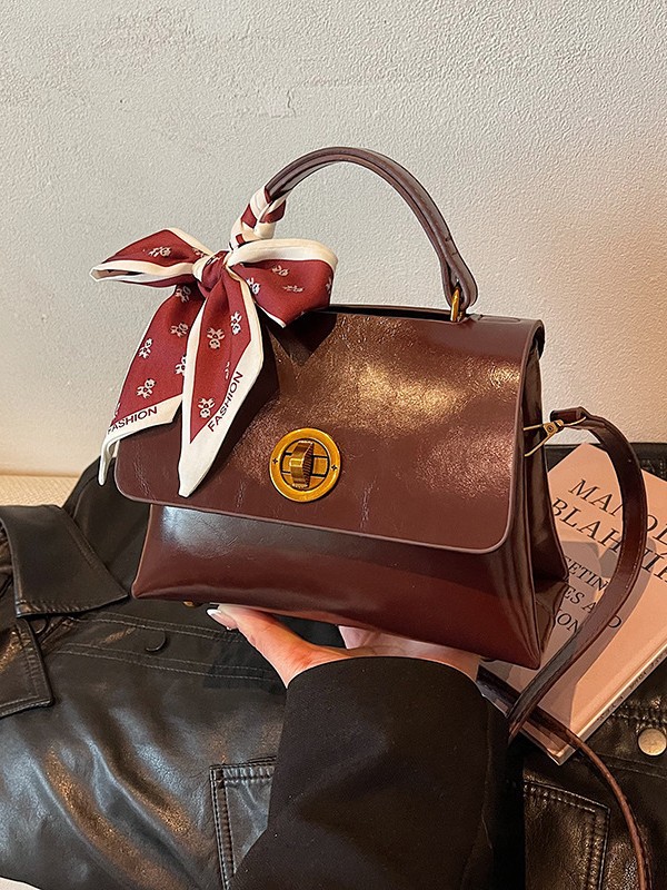 2025 nuevo bolso de mujer portátil casual de moda retro otoño e invierno bolso de mensajero de un solo hombro con sentido de diseño de nicho
