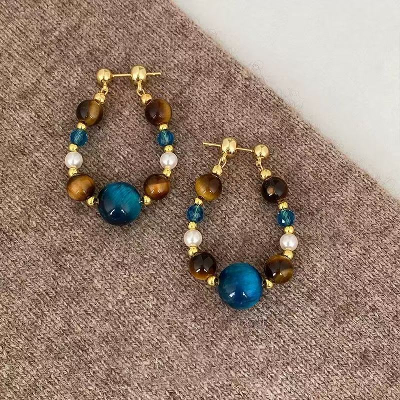 Cross-border light luxury vintage tiger eye stone beaded earrings for women, versatile and elegant blue pearl earrings with a high-end feel