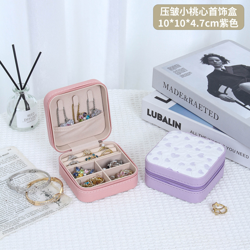 Nueva caja de joyería portátil dulce alta sensación de joyería collar anillo pendientes joyería almacenamiento transfronterizo