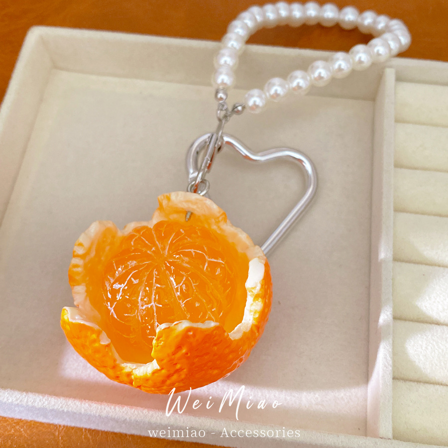 Naranja perla cuentas personalidad temperamento nicho moda cadenas de teléfonos móviles accesorios frescos accesorios al por mayor image 3