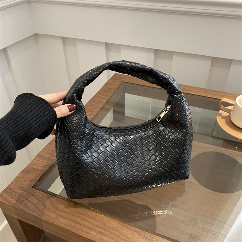 2024 bolsa de tejido de invierno para mujeres nuevas bolsas de bolsillo de estilo extranjero nicho de textura bolsas de viaje versátiles bolsas de mano bolsas ocio