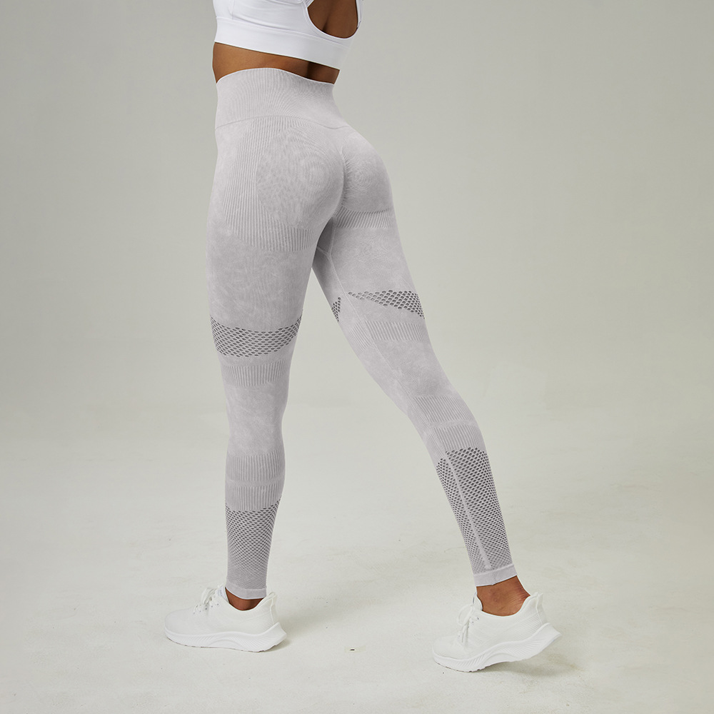Nuevo hollow-out pantalones de yoga sin costuras ropa de cintura alta Peach Hip lifting fitness pantalones de las mujeres lavado esmerilado apretado Pantalones deportivos
