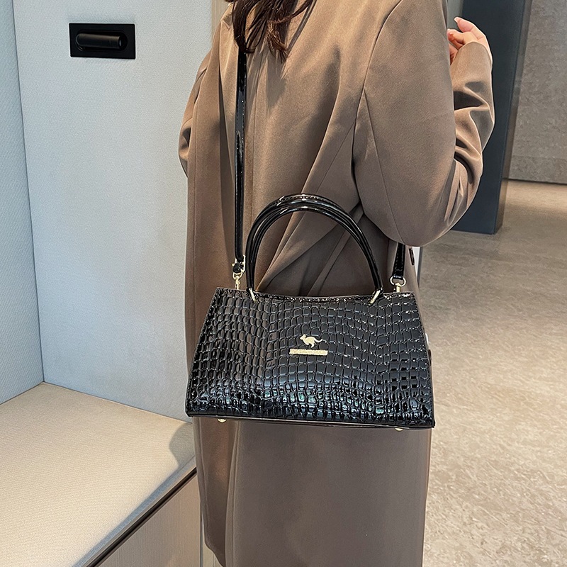 Bolso de gran capacidad 2023 nuevo bolso de mensajero de un solo hombro de moda bolso de patrón de piedra de superficie brillante simple bolso de textura