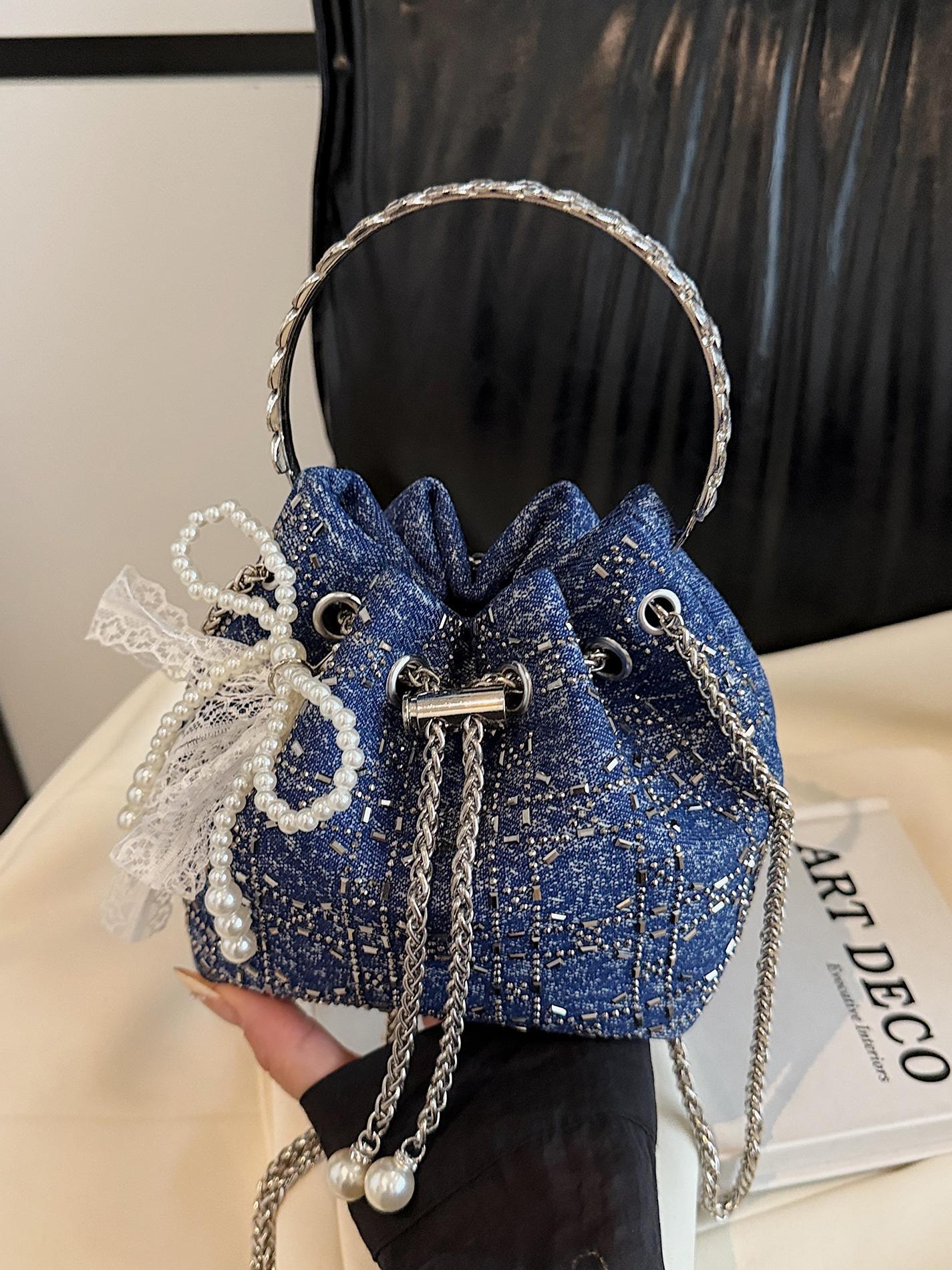 Verano popular taladro caliente bolso de cubo de mano mujer 2025 nuevo estilo coreano denim casual mochila para trabajar