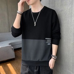 春秋の男性服のファッションがゆったりしている長袖tシャツに合わせて、韓国版ins秋の男性服の上着を着ます。