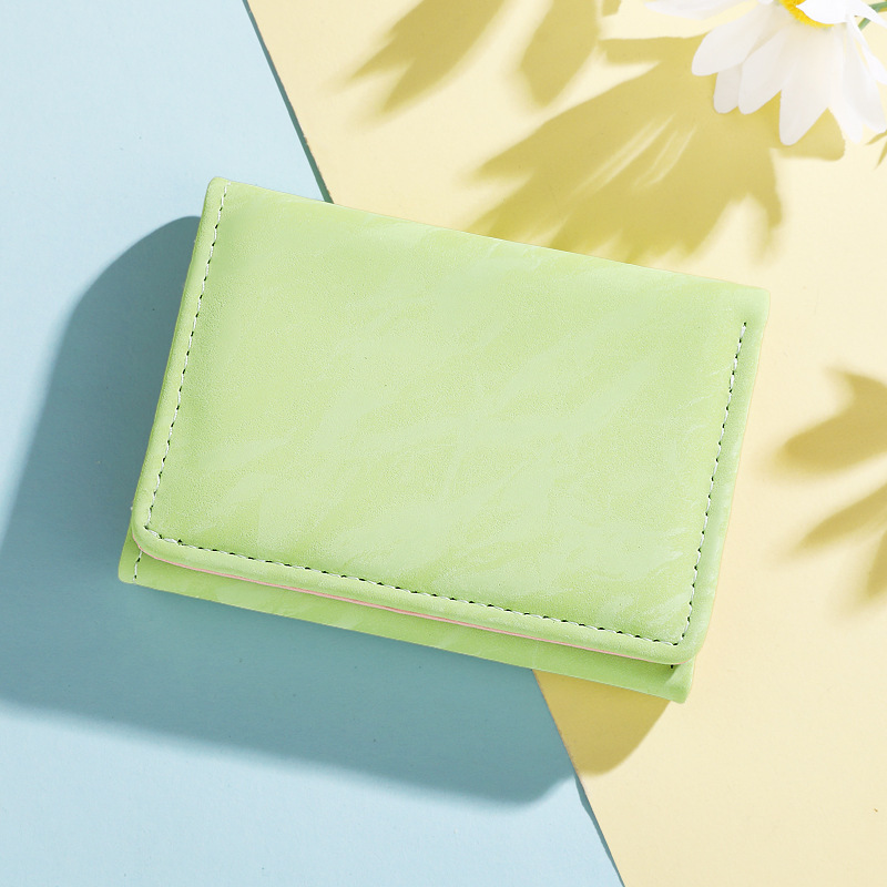 Ventas transfronterizas calientes de 30% billetera de descuento de agua corrugada de moda de estudiantes billetera de cambio de billetera universal bolsa de tarjetas para mujeres