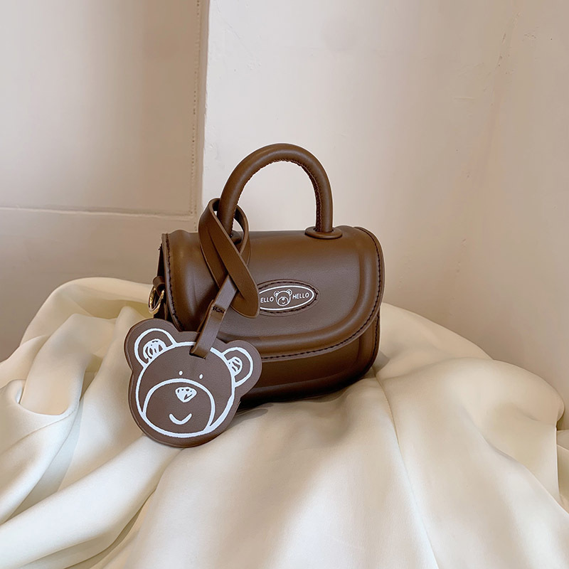 2023 otoño nuevo estilo coreano nicho niños mini mano de la muchacha llevar crossbody accesorios lápiz labial pequeña bolsa al por mayor