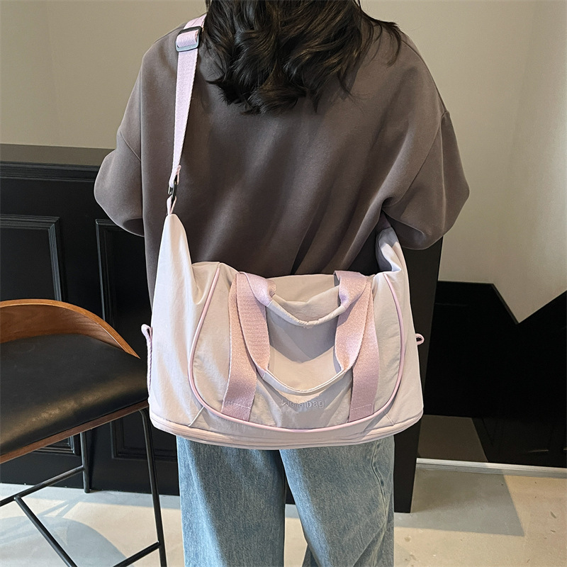 Bolso de viaje portátil coreano transfronterizo nuevo bolso de gimnasio ligero de gran capacidad bolso de viaje de viaje simple de ocio