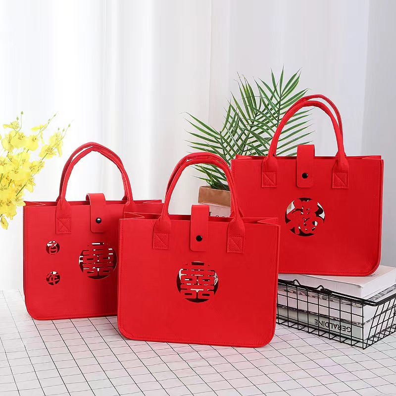 2025跨境喜字镂空毛毡包结婚礼品伴手礼批发毛毡手提袋环保婚庆