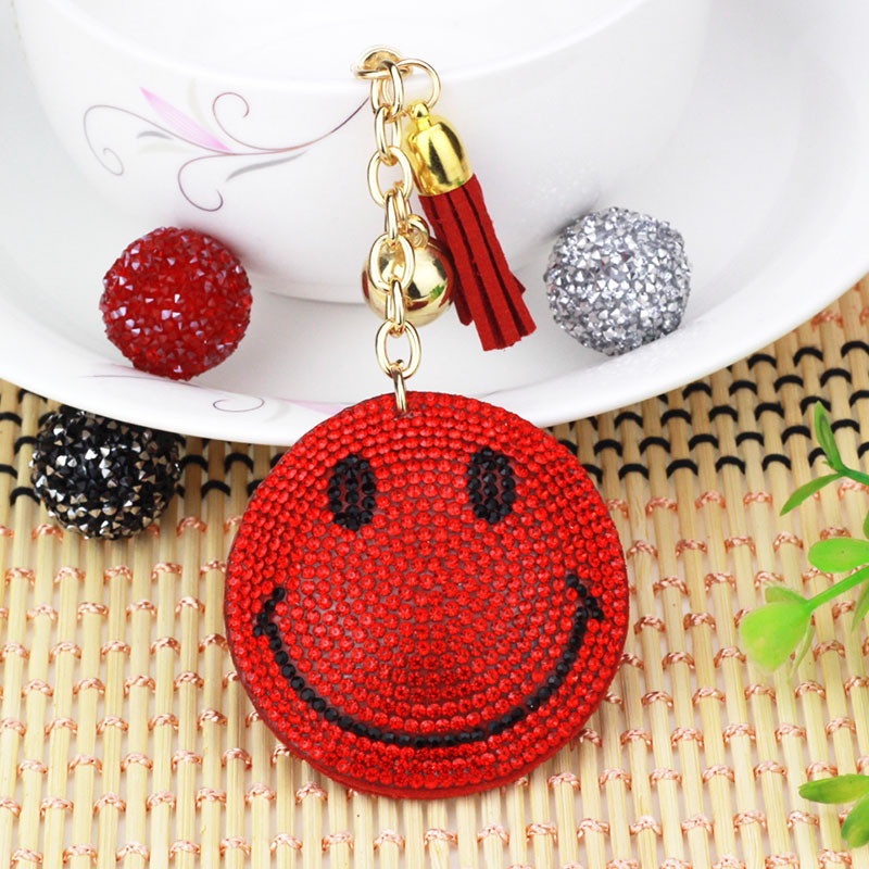Nuevo creativo cara sonriente coreana llavero de diamante de moda borda de dama bolsos colgantes joyerías de comercio exterior al por mayor