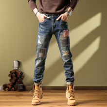 拼接设计牛仔裤男款修身小直筒弹力美式潮流不规则破洞补丁长裤