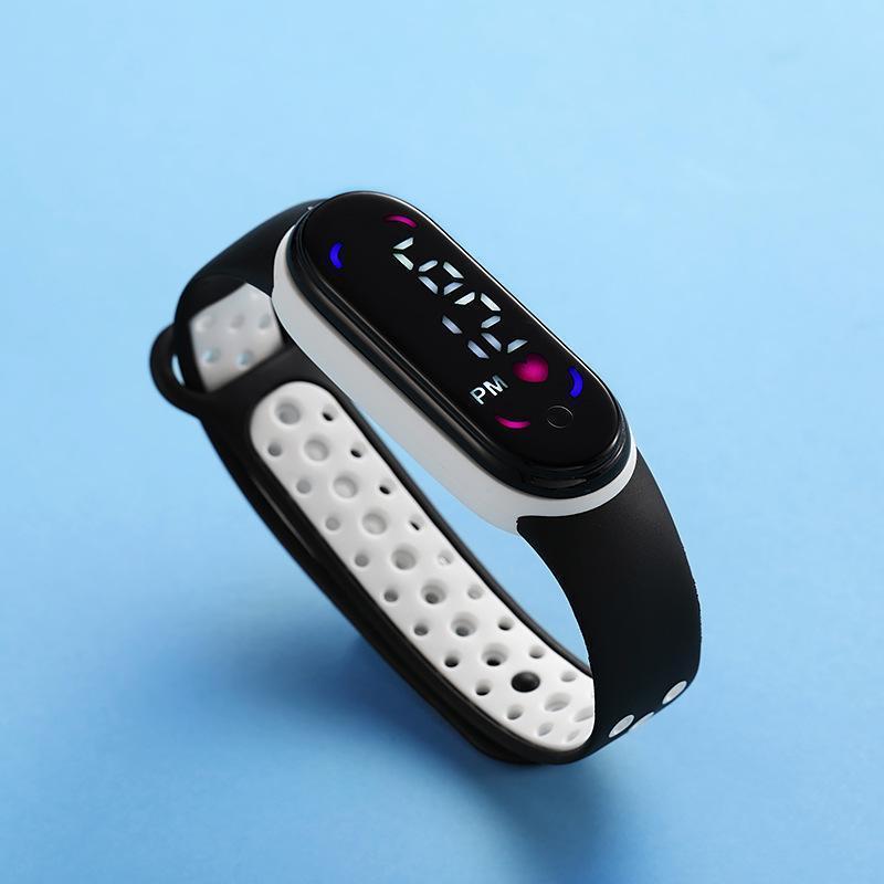 Comercio exterior Venta caliente 50 m natación M7 doble color con LED reloj electrónico niños estudiante deportes impermeable mano táctil