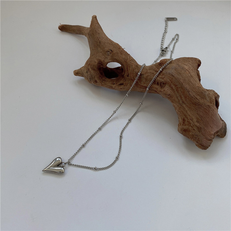 Collier long pendentif cœur géométrique vintage pour femme_voghion.com