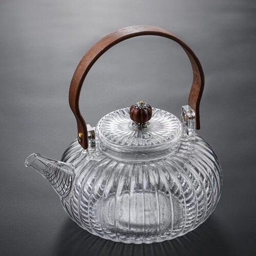 Pumpkin-patterned handle kettle, high borosilicate heat-resistant glass flower tea pot with filter mesh, electric ceramic stove tea kettle for wholesale
