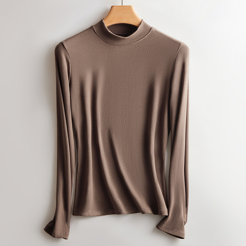 2024 Camisa de fondo de manga larga con hilo de cuello redondo de otoño e invierno simple con un top cálido de mujer delgado de gran tamaño