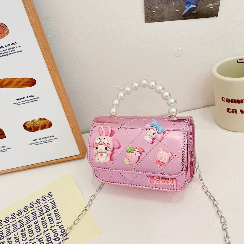 Bolso infantil 2024 nuevo estilo coreano de cadena de dibujos animados bolso de hombro estilo Xiaoxiang Ling mochila para hombres y mujeres bolsos pequeños