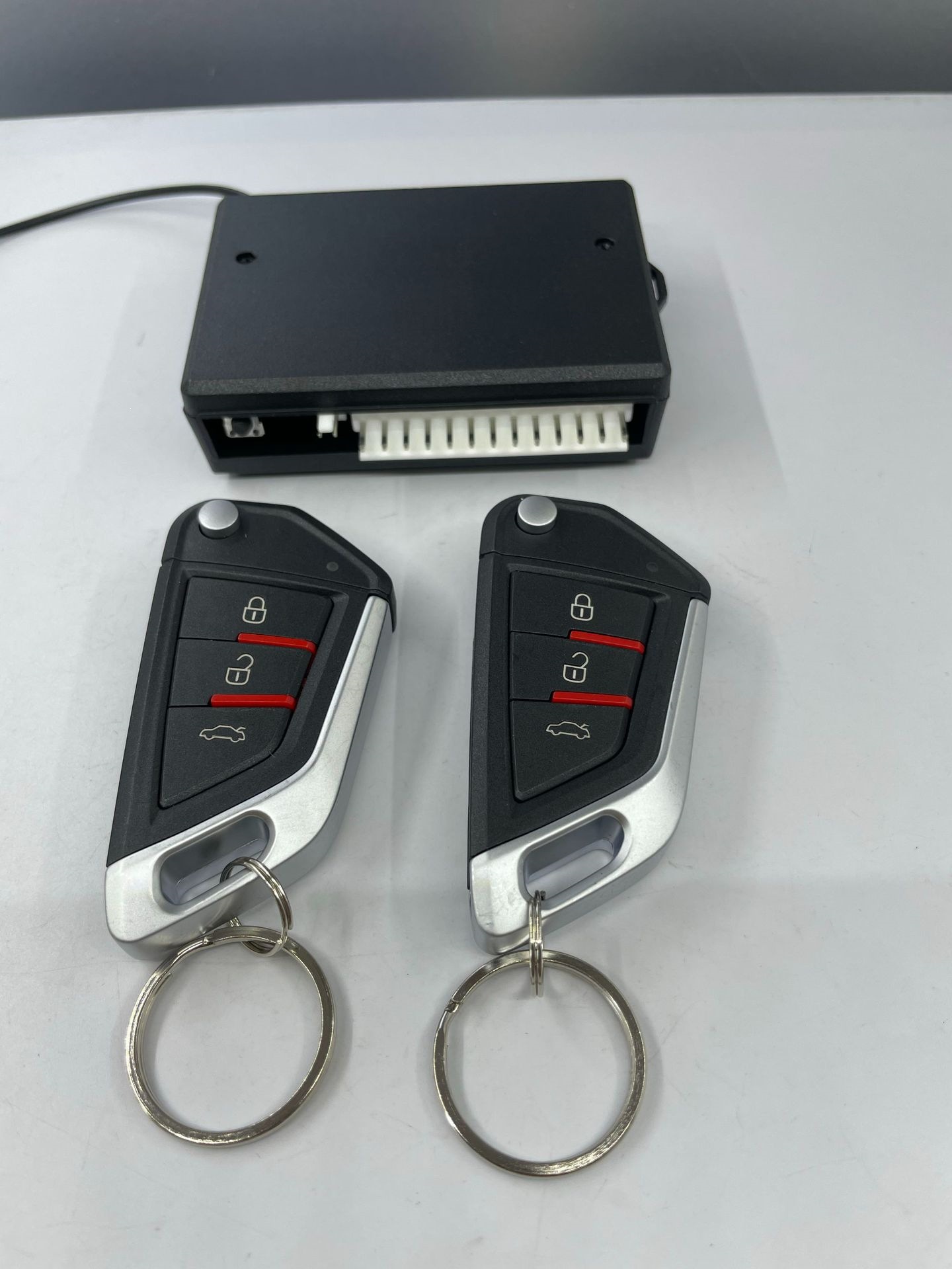 Car anti-theft device, remote control for central locking, remote control switch, keyless entry