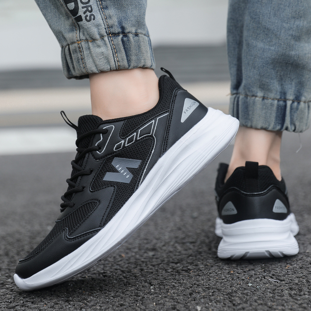 Zapatos deportivos de pareja en línea rojo con zapatos de corrida de otoño pegado en frío color mosaico de piel de malla empalmada suela suave zapatos transpirables de hombre al por mayor