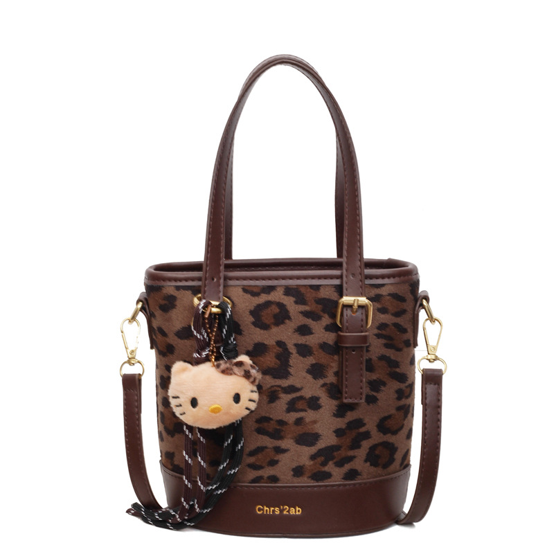 Cross-border coreano nicho esmerizado bolso de cubo de mano mujer 2025 nuevo invierno retro mochila de hombro mochila de viaje