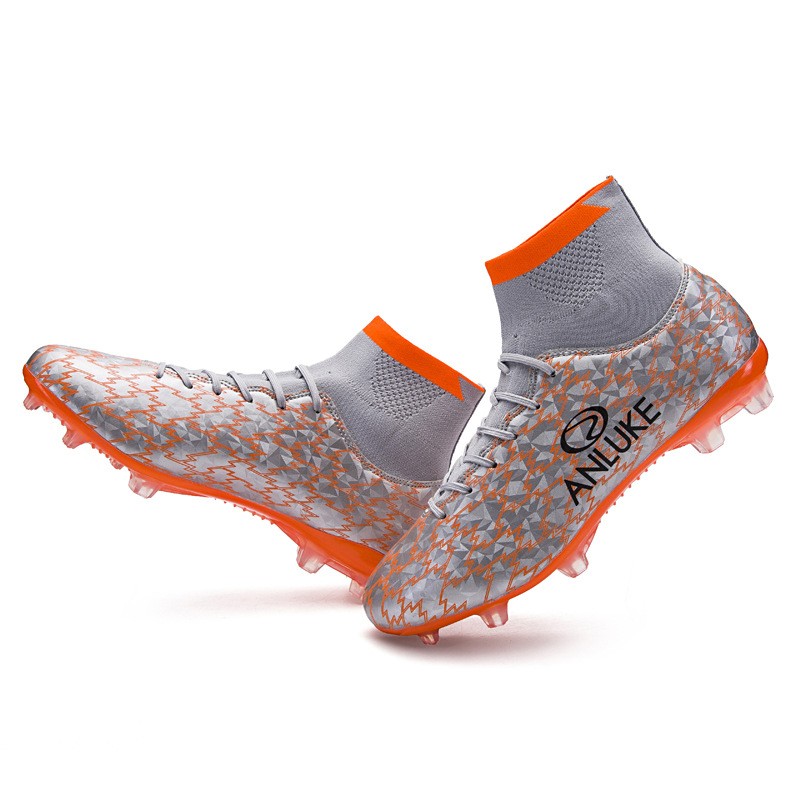 2022 transfronteriza nuevos zapatos de fútbol FGTF zapatos de fútbol de uñas cortas transpirables para hombres zapatos de entrenamiento de hierba