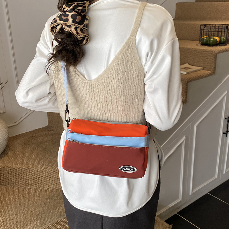 Mochila de moda para niños de color contrastante, mochila de ocio, deportes de viaje ligero, mochila de hombro para niños y niñas, nuevo tipo de bolso para niños