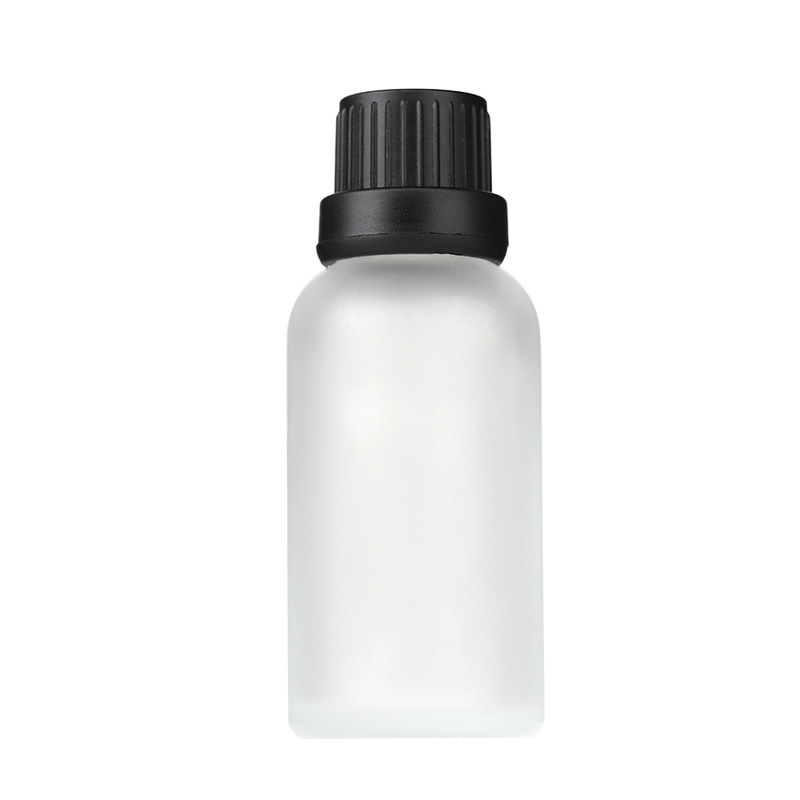 Botella de aceite esencial de vidrio de arena esmerizada al por mayor 30ml botella de muestra pequeña botella de embalaje de cosméticos portátiles