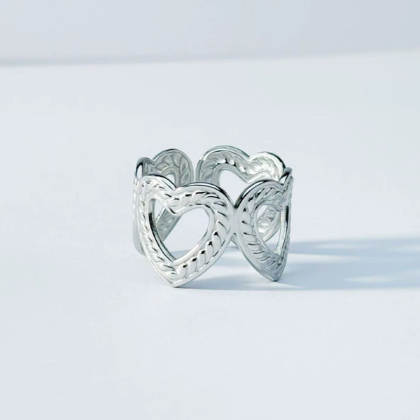 Silver hydraulic hollow heart ring