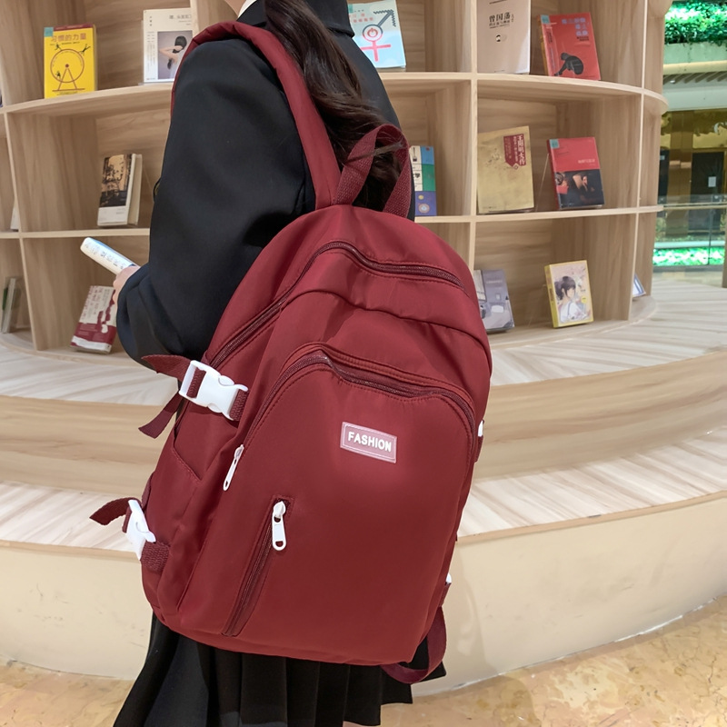 Nueva mochila de gran capacidad de 2025 moda coreana ocio simple mochila de escuela secundaria mochila de viaje de gran capacidad