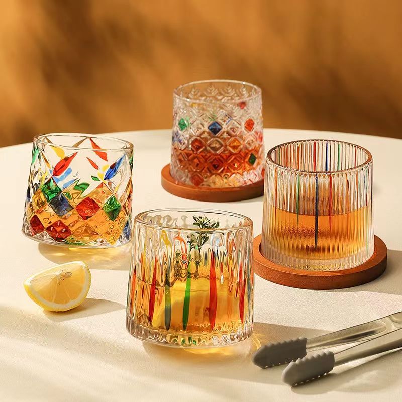 Creative rotating glass roly-poly doll for whiskey