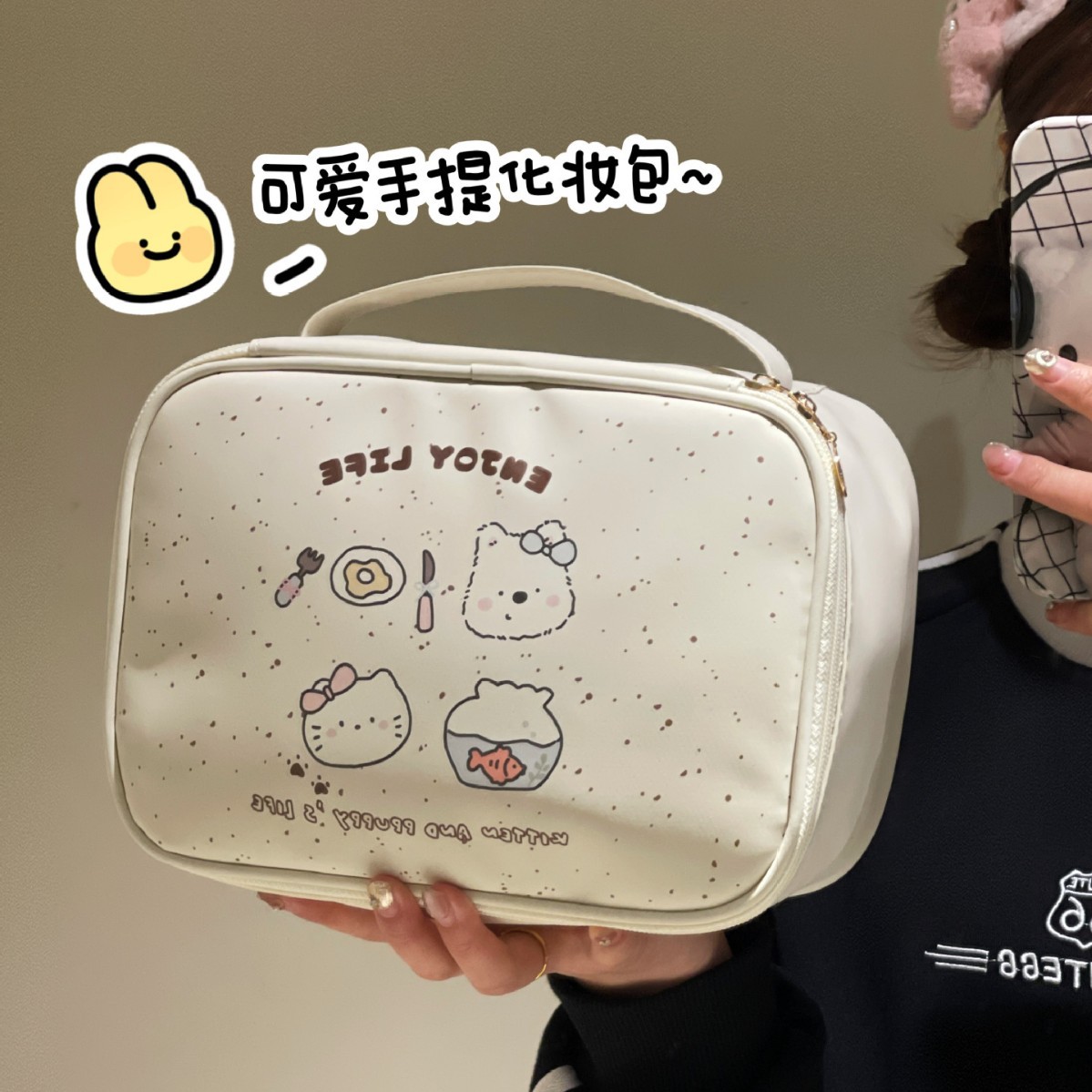 Bolsa de cosméticos original linda tridimensional de gran capacidad 2025 nueva bolsa de almacenamiento de partición portátil femenina bolsa de almacenamiento de cosméticos