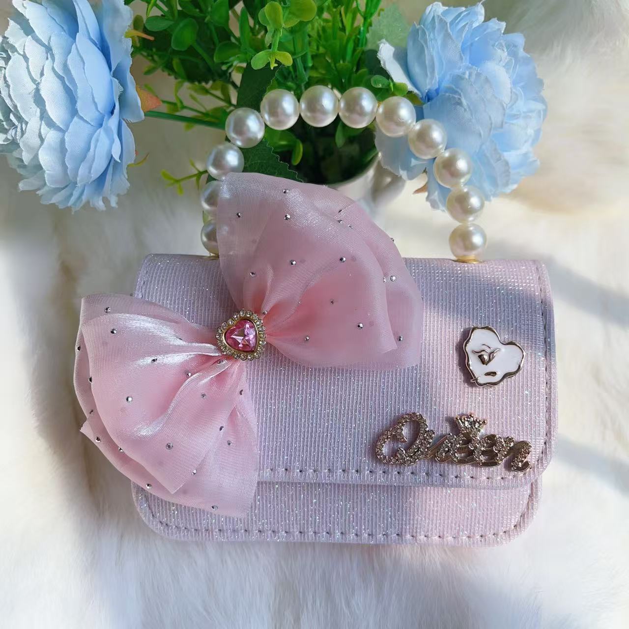 Bagos de perlas para niños 2025 nuevos bolsos de niños bolsos de mochila de niñas bolsos accesorios de princesa bolsos de viento de fragancia