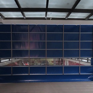 The sun shines around the fire garage PVC fast stacking door cold storage induction industrial door electric fast rolling shutter door