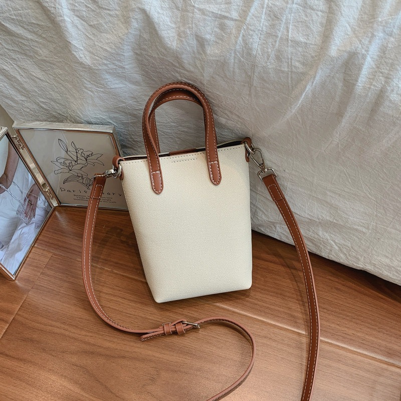 Casual nuevo bolso de verano de mujer inclinado 2026 cubo de hombro portátil versátil bolso pequeño teléfono móvil