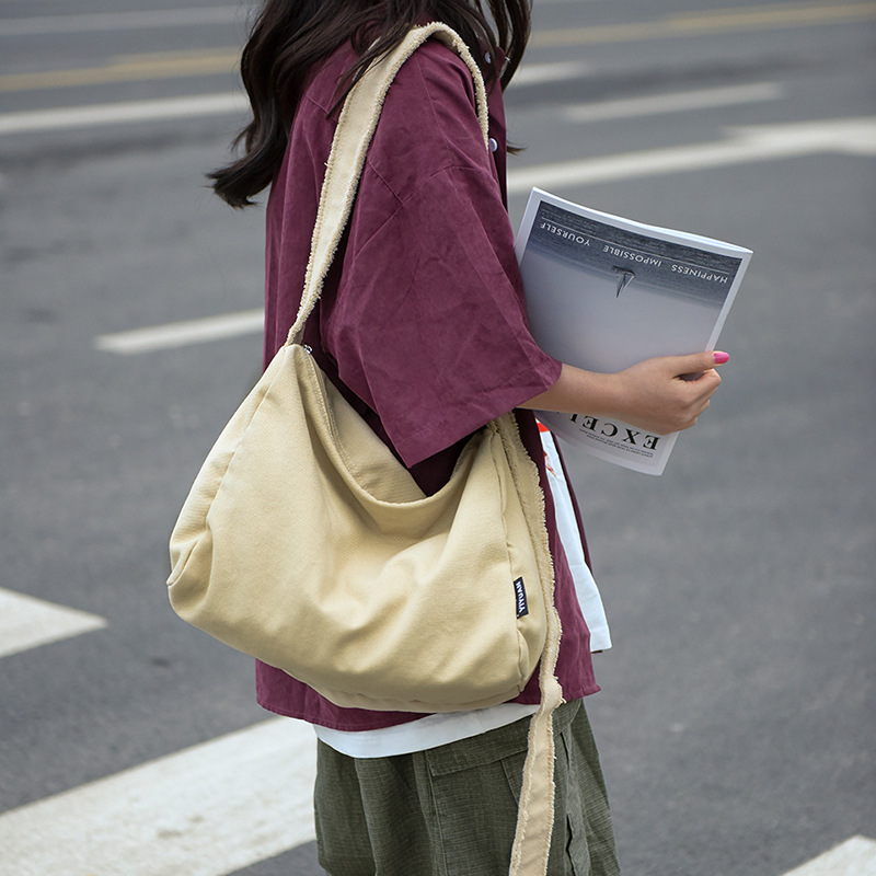 Bolso bandolera de un solo hombro de la marca de moda japonesa Bolso de viaje simple y versátil de gran capacidad resistente al desgaste Bolso portátil portátil portátil de viaje ligero