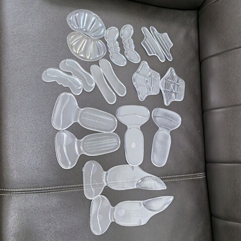 Foot-grinding stickers heel anti-grinding stickers thickened half-size pad adjustment shoe size leather shoes high heels anti-grinding heel stickers wholesale