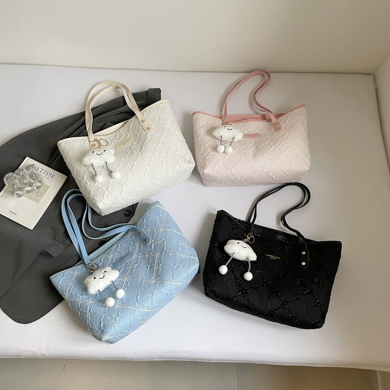 Tendencia transfronteriza coreana bolso de mano bolso de mujer 2025, nuevo otoño bolso de hombro de aire extranjero a rejilla bolso de brazo de viaje