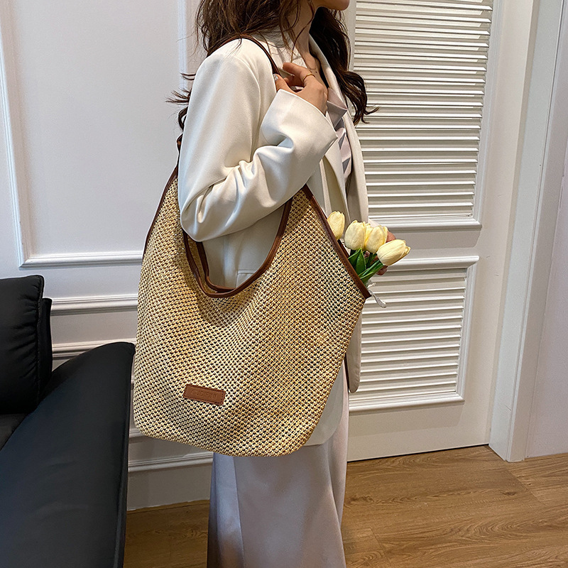 2025 Woven Straw Bag for Women, Versatile and Fashionable Korean Niche Shoulder Bucket Bag, Simple Beach Bag for Summer 2025 Woven Straw Bag for Women, Versatile and Fashionable Korean Niche Shoulder Bucket Bag, Simple Beach Bag for Summer