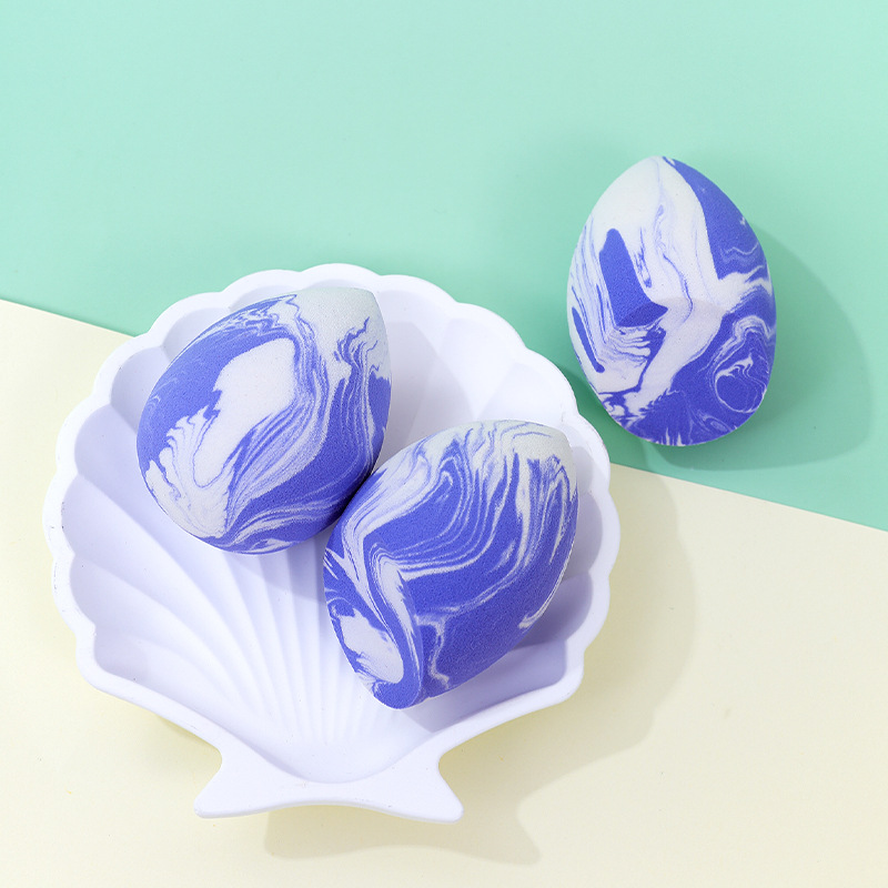 Colores mezclados personalizados de fábrica gotas de agua maquillaje de belleza huevo soplo de polvo maquillaje transfronterizo en forma de calabaza esponja cojín de aire huevo de maquillaje sin látex