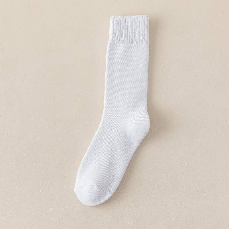 Calcetines de otoño e invierno de las mujeres engrosadas medias calientes tubo largo negro de las mujeres Toalla de invierno con forro polar inferior pantorrilla tubo alto Terry