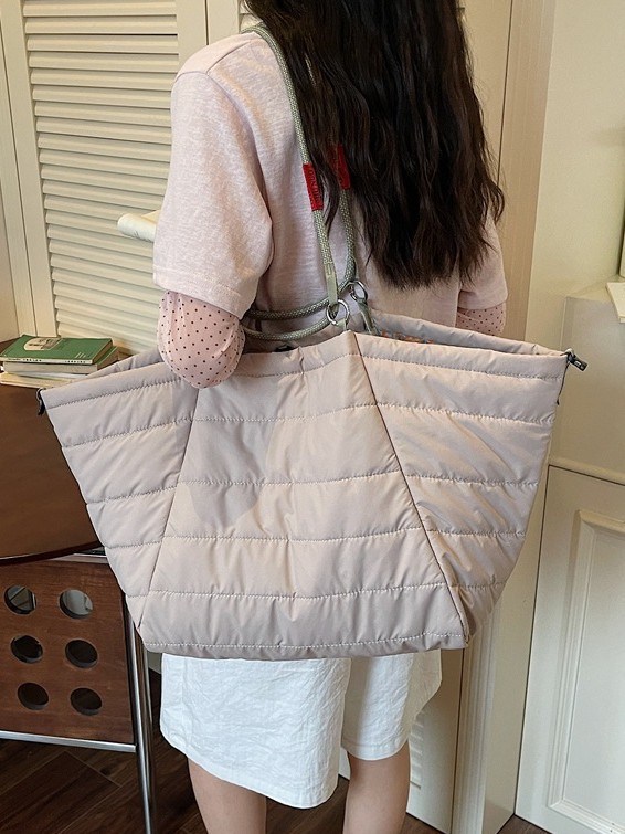 Simple primavera y verano nuevo 2026 nube hombro bolsa de gran capacidad de viaje de viaje de acondicionamiento físico bolso portátil mujer