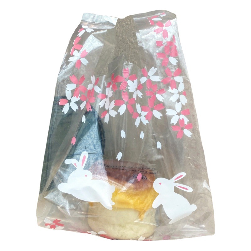 Té de leche transparente Postre para llevar bolsa de embalaje bolsa de plástico engrosada flor de cerezo conejo bolsa de pan un paquete de 50 piezas en stock ahora disponible