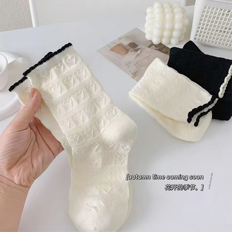 Calcetines primavera y verano niñas tubo medio color sólido mujer todo fósforo jk personalidad de tendencia tubo medio largo color sólido aguja gruesa apilamiento calcetines estilo delgado