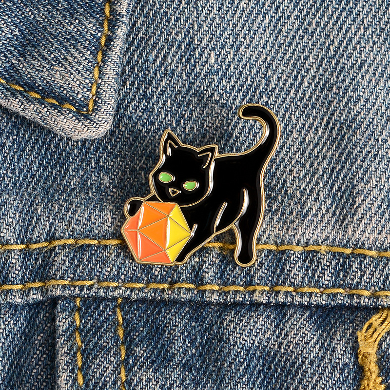 Creative Cartoon Black Cat Holding Ball Shape Alloy Brooch Clothes Badge Wholesale display picture 4