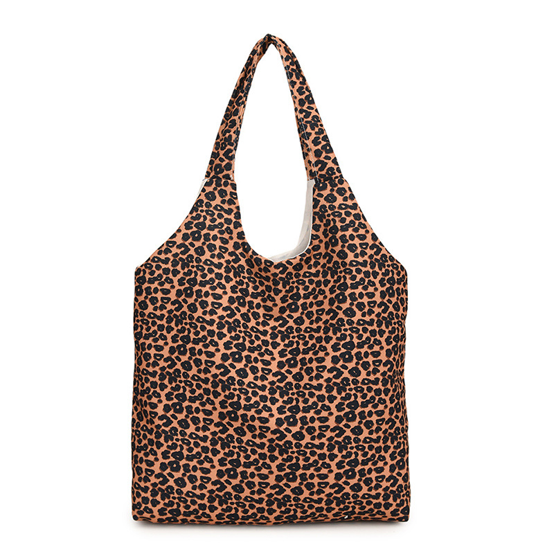 La sensación de relajación de la personalidad de la bolsa de leopardo de gran capacidad de mujer nueva bolsa de algodón simple de hombro universal bolsa de viaje de clase