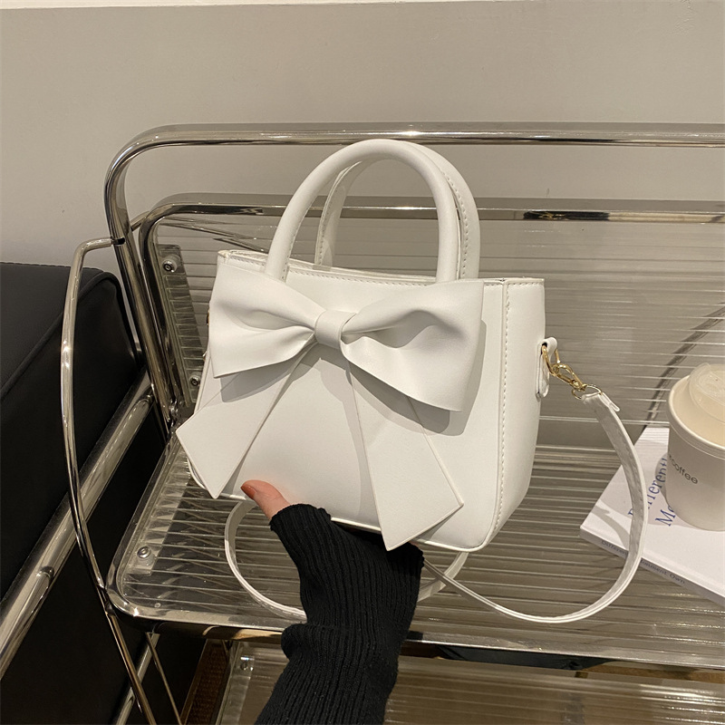 Bolso de mano con lazo simple de moda suave 2024 primavera y verano nuevo color sólido bolso de mensajero de hombro coreano bolso femenino