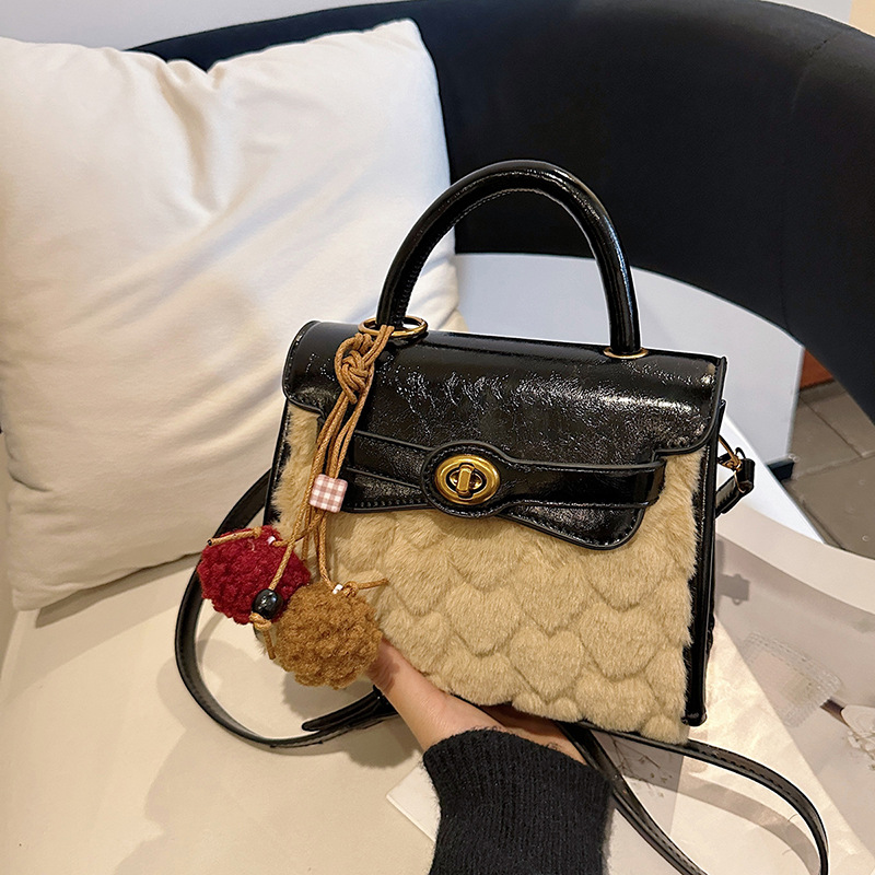 Otoño y invierno de alto nivel bolso de lana portátil para mujeres 2025 nuevo nicho Zhong commuting bolso de hombro bolso casual Kelly