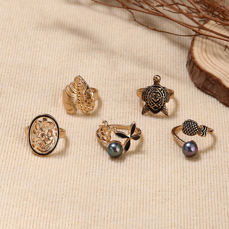 Cross-border Ring Set Fashion Colorful Gray Pearl Hollow Carved Leaves Tortoise Ring 5-piece Set display picture 4