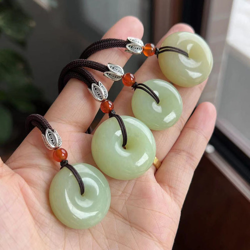 Natural jade peace buckle Hetian jade button pendant Xiuyan tremolite yellow and white old jade peace buckle pendant wholesale