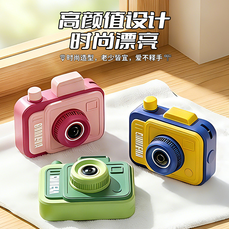 cámara de simulación de doble cara pistola de agua mini extraña gadget de presión de disparo pistola de agua de agua de niños juguetes de agua