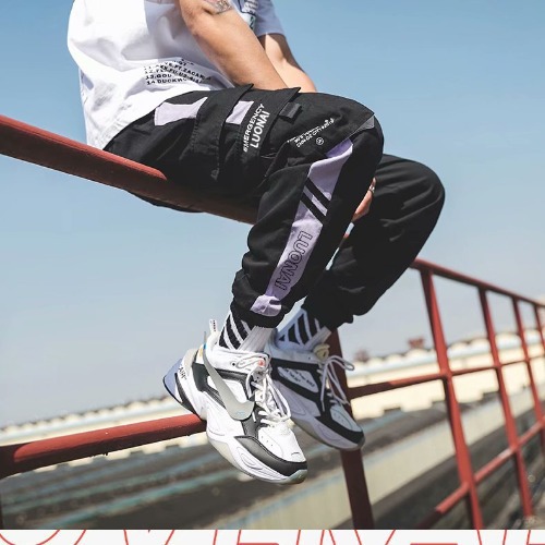 Fábrica al por mayor overoles primavera y otoño de los hombres pantalones atados al tobillo jóvenes de los hombres pantalones atados al tobillo pantalones casuales sueltos de los hombres